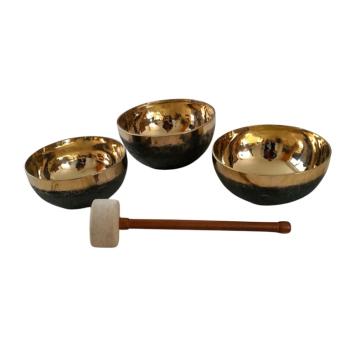 Ganzheitliche Harmonie - Set aus 3 Klangschalen in schwarz-gold, Ø 19,2 - 22 cm, 3,65 kg